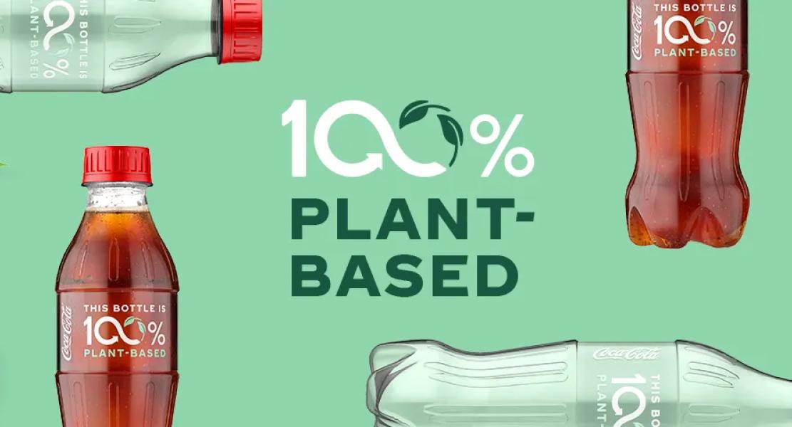 The image features Coca Cola's brand campaign of plant-based coke drink.